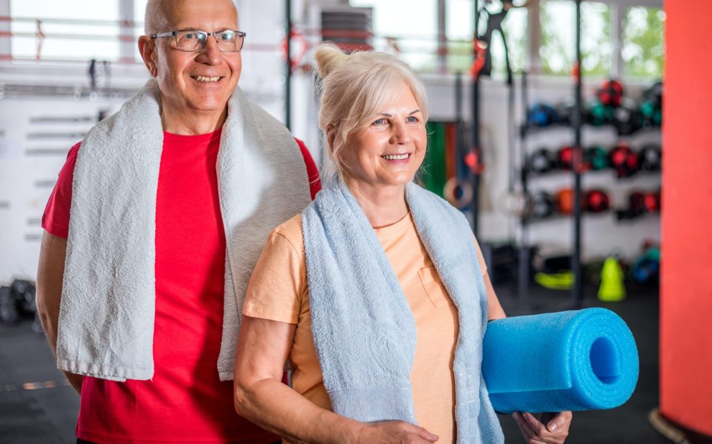 Senior couple ine the fitness club