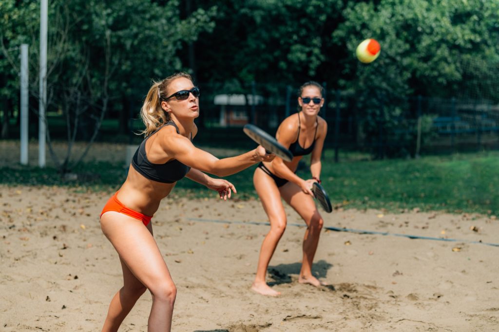 Women Playing Beach Tennis